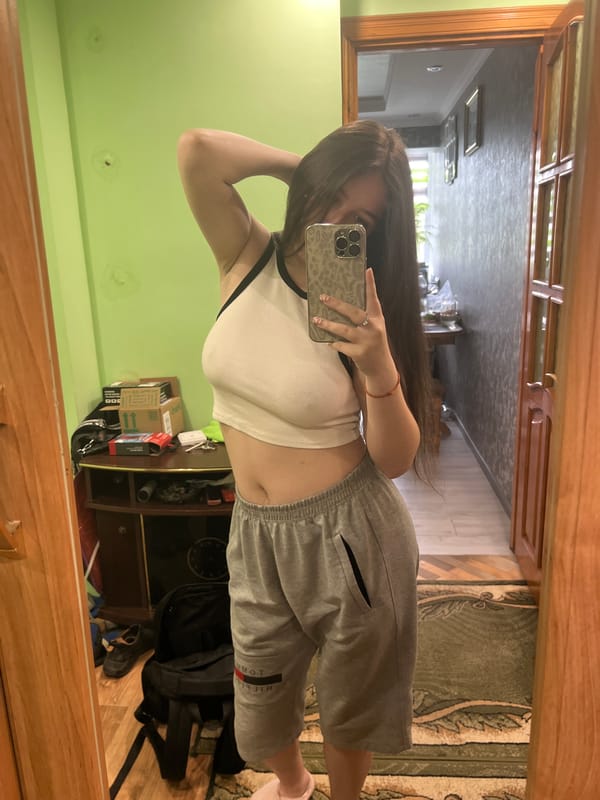 Woman takes selfies at home in Cherliany, Ukraine