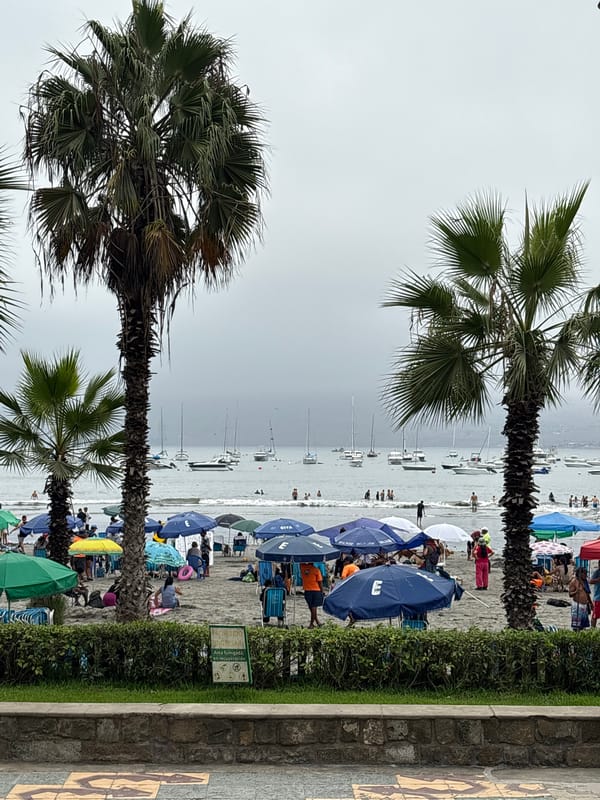 Crowded beach day captured at Ancón, Peru coastline