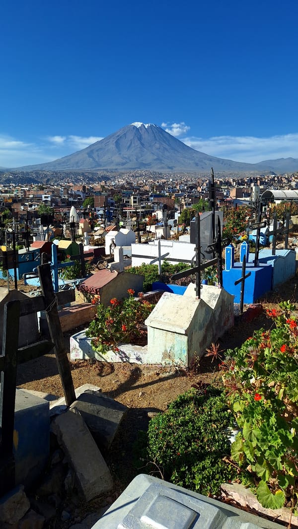 Cemetery visit and neighborhood scenes documented in Paucarpata, Peru