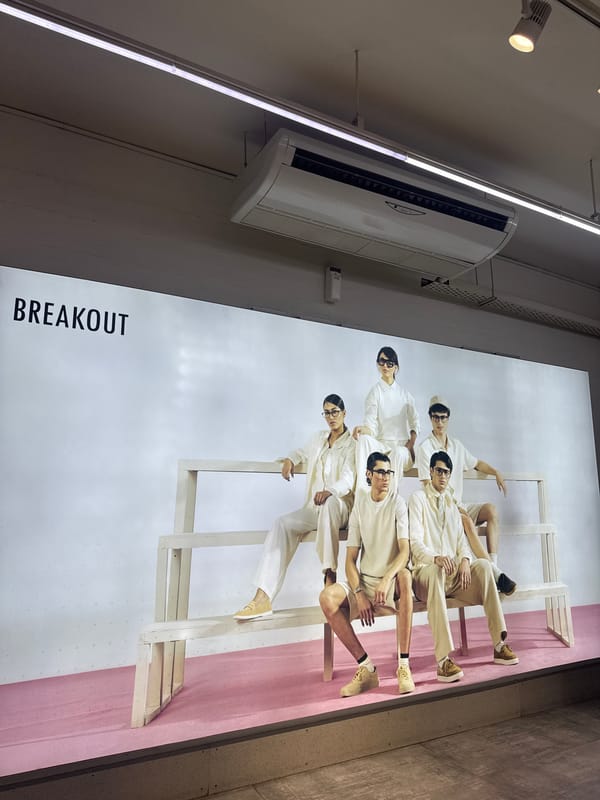 Customers Browse and Take Selfies at Lahore Clothing Store