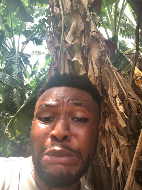 Man in apparent medical distress documented in outdoor location