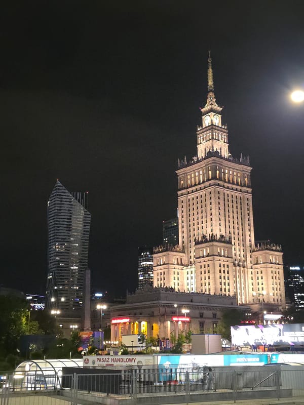 Nighttime views of Warsaw's Palace of Culture documented downtown