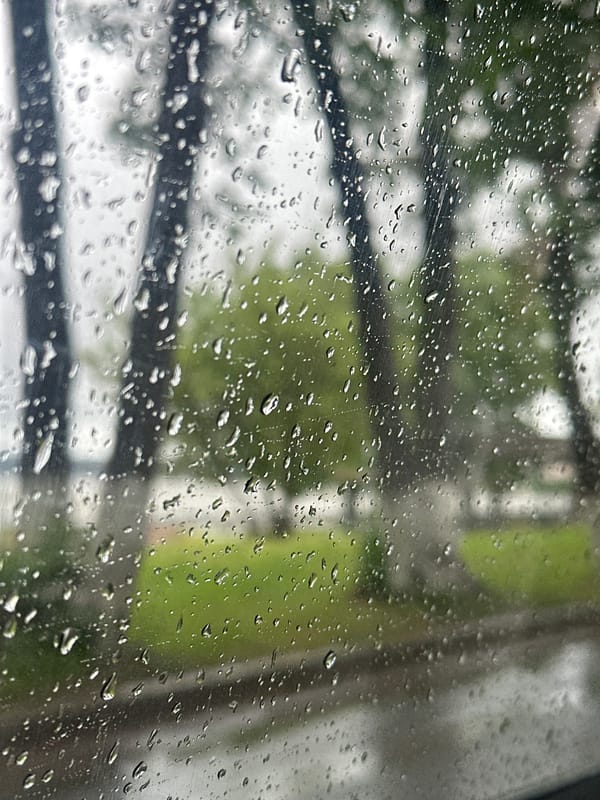 Rainy morning observed through window in Votkinsk, Russia
