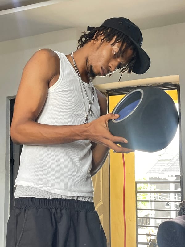Home studio session in Abuja with music gear and phones