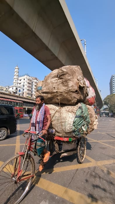 Morning street life documented across Dhaka during rush hours