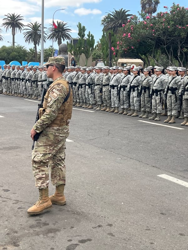 Military formation ceremony observed on Arica street near El Morro