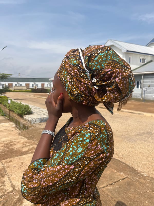 Portrait and medical facility exterior, Barakin Mairaga, Nigeria