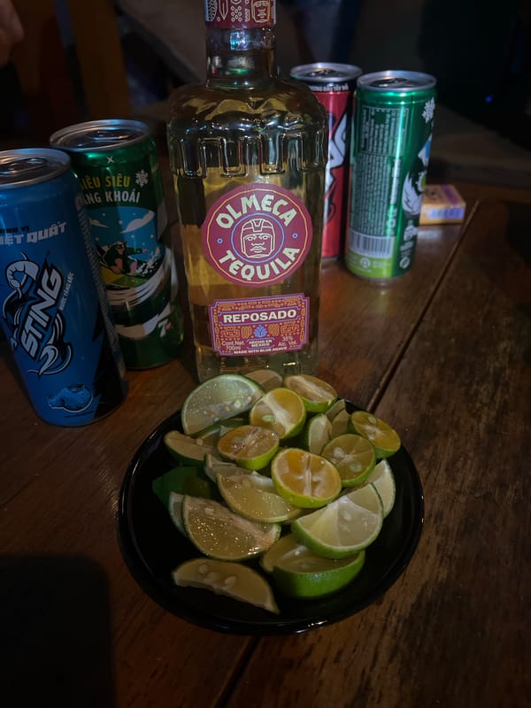 Olmeca Reposado and lime wedges on a table in Phú Quốc