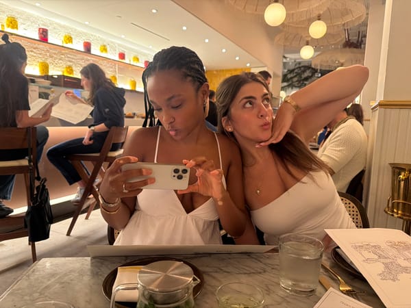 Selfie moment at an upscale NYC restaurant table