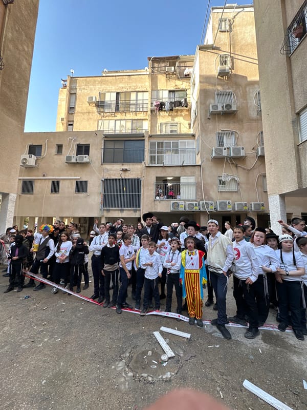 Costumed gatherings continue amid building damage in Bnei Brak