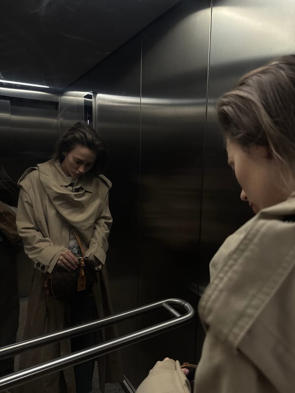 Woman in tan coat spotted shopping across multiple stores
