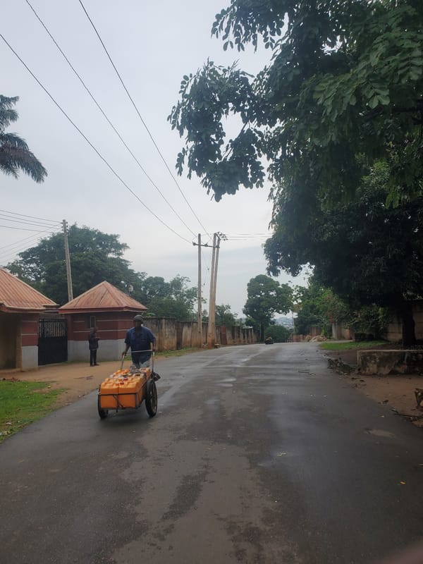 Overcast afternoon street life in Jos, Nigeria neighborhoods