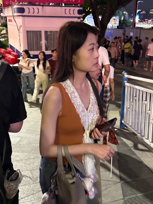 Chongqing's Yuzhong District lit up on a busy summer night