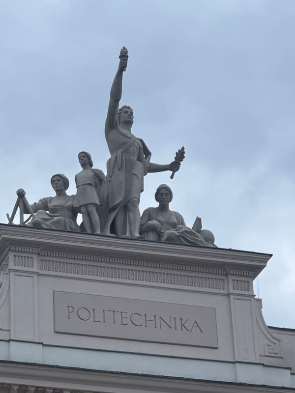 Warsaw University of Technology facade and entrance sculpture, up close