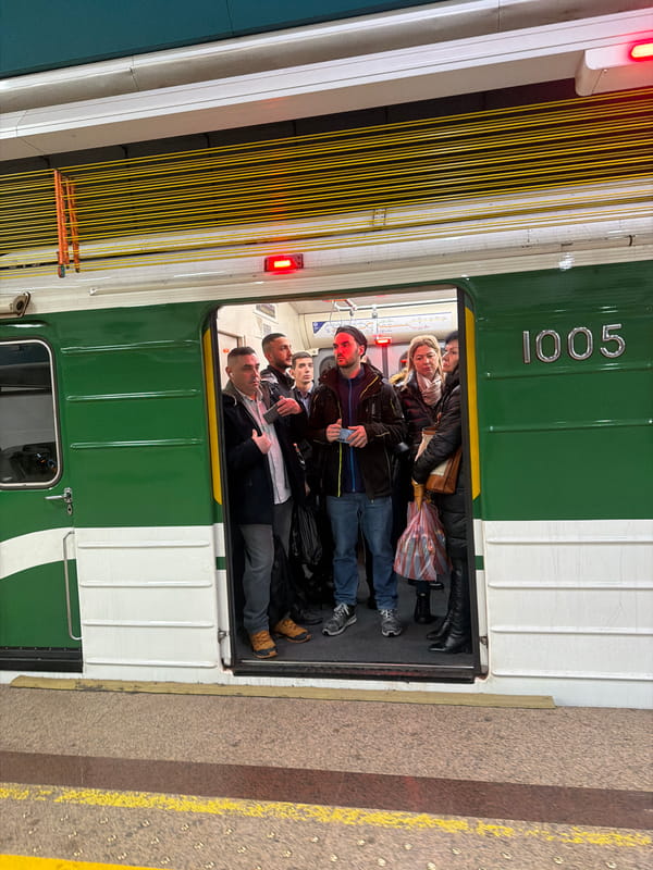 Packed subway car 1005 carries crowded passengers in Sofia