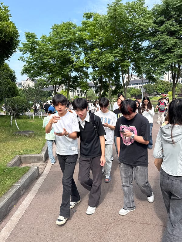 Young people queue outside building in Jiangjin, China