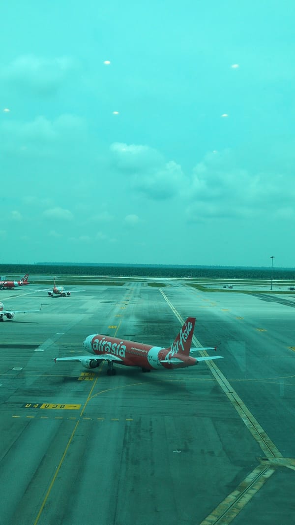 Early morning AirAsia operations documented at Sepang airport