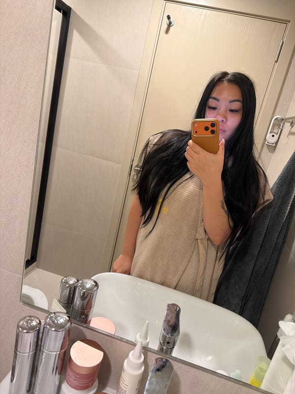 Woman takes bathroom selfies in Kathu, Thailand