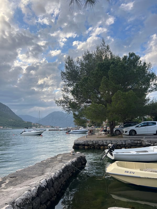 Tourist captures scenic waterfront moments in Dobrota, Montenegro