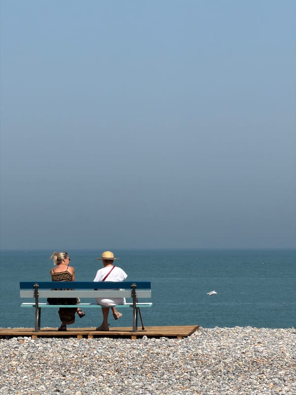 Summer morning along Dieppe's beach, castle, and seafront streets