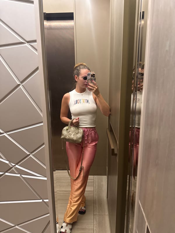 Woman Takes Mirror Selfie in Elevator, Khimki Russia