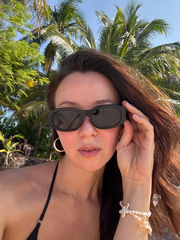 Woman documents early morning beach visit in Dapa, Philippines