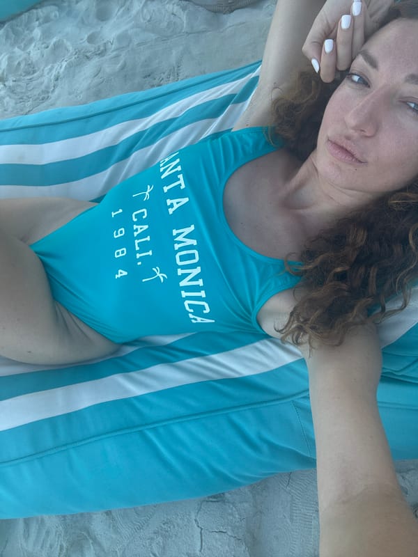 Lounging on a striped beach chair in Ko Samui