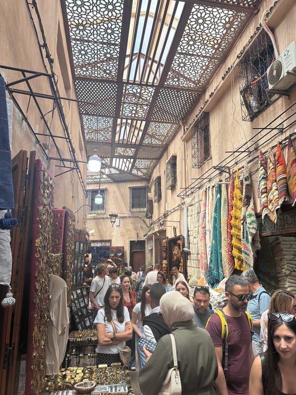 Traditional Moroccan souk displays crafts and ceramics in Marrakesh