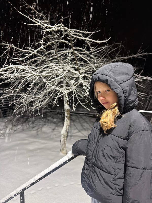 Person photographed in snowy nighttime scene in Markovo, Russia