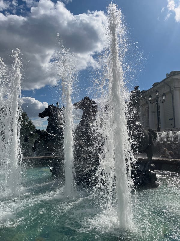 Central Moscow fountains, plazas, and a ceremonial procession