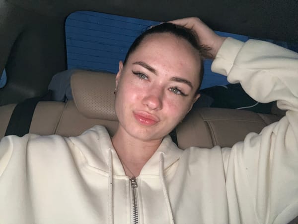 Selfie series in a cream hoodie across a few locations