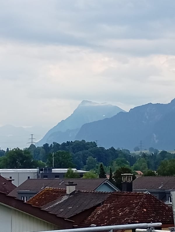 Overcast morning in Wattenwil, solar panels and alpine views