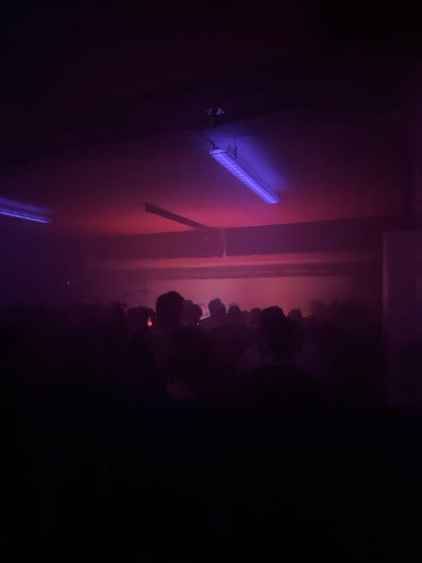 Dark space with colored lighting captured in Paris