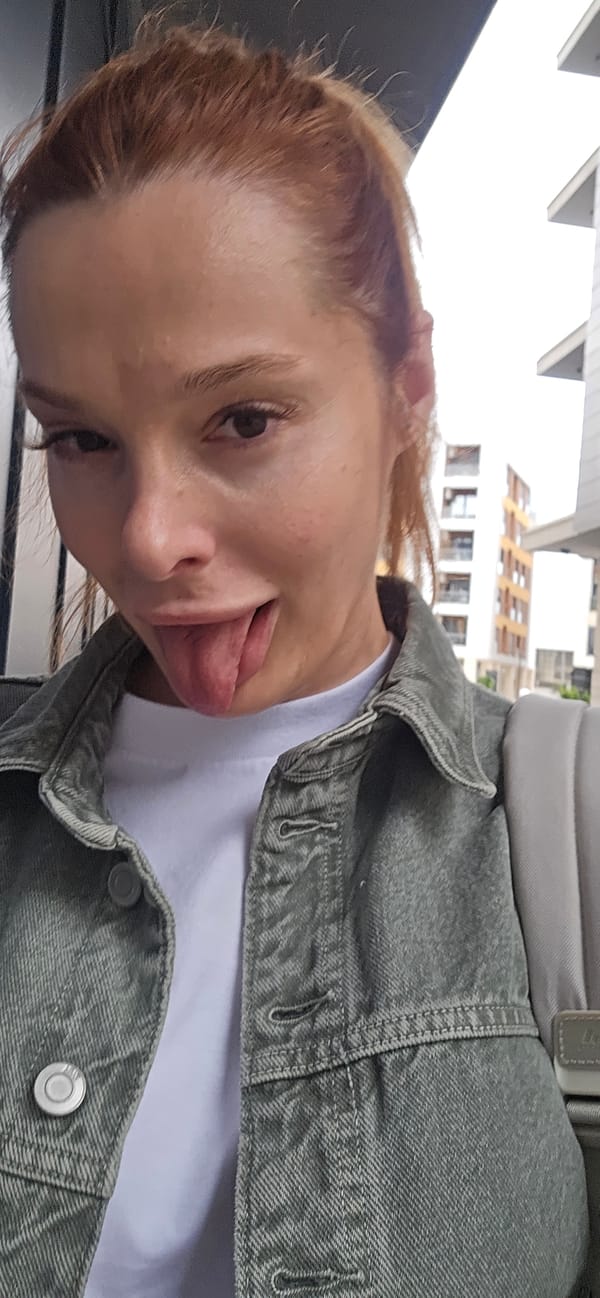 Woman takes playful selfies in Podgorica Montenegro