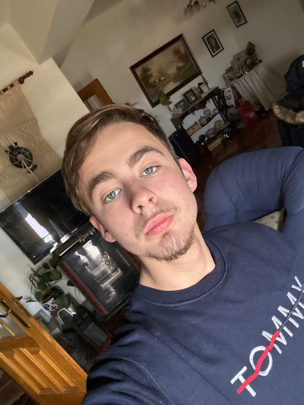 Young man takes indoor selfie in Vila Real