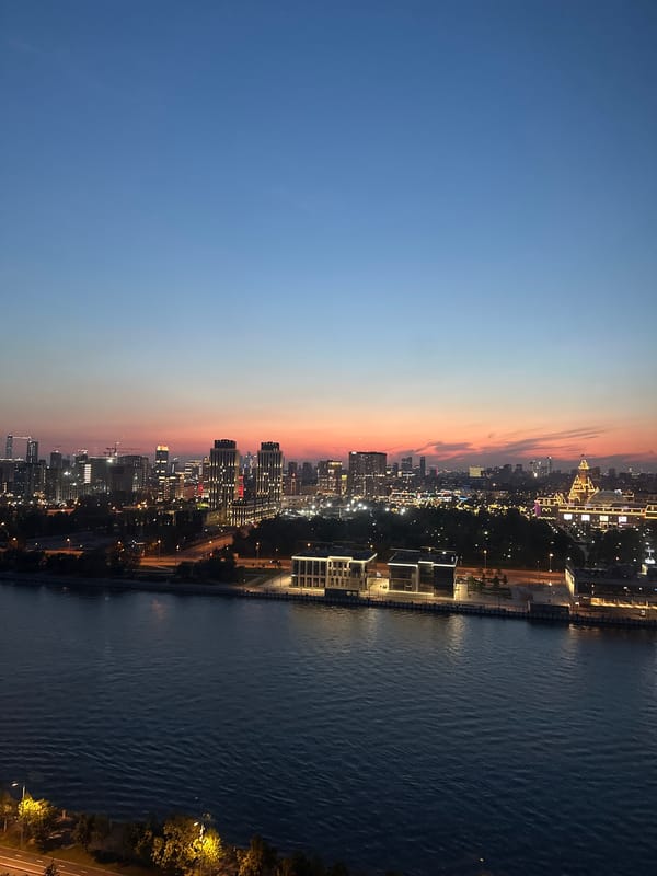 Moscow skyline at dusk, river and fading light