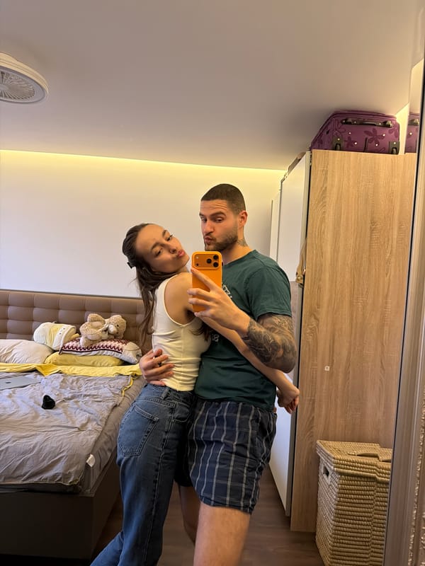 Couple takes selfies in bedroom in Sofia