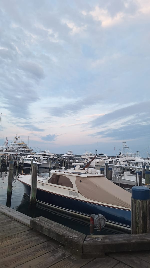 Nantucket harbor at rest, boats moored in still water