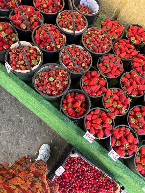 Fresh strawberries displayed at outdoor market in Tbilisi