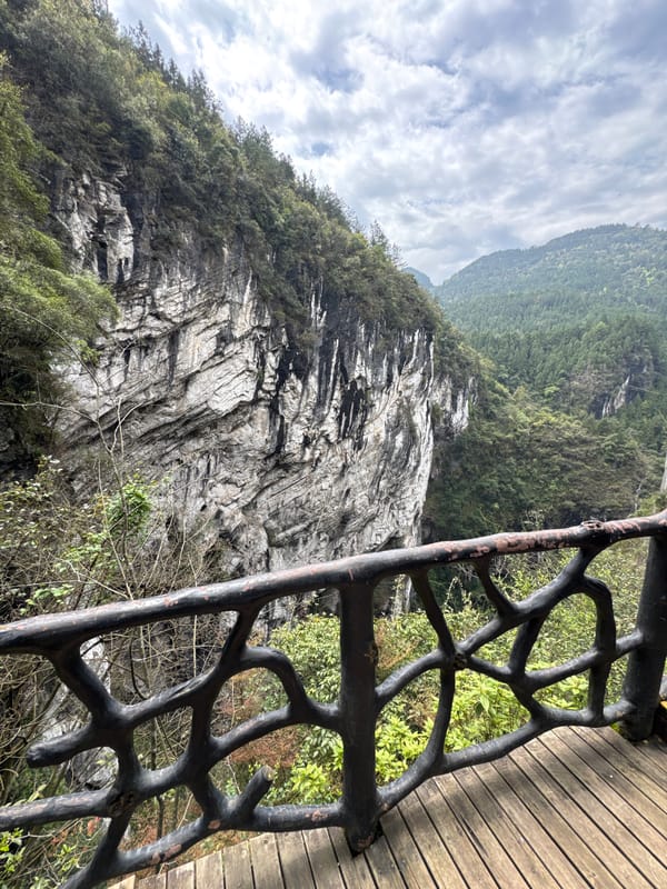 Tourist takes selfies at Shui Cave scenic area
