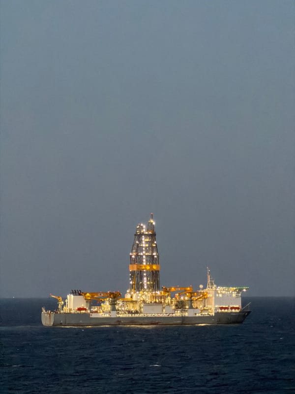 Offshore drilling platform spotted at sea during dawn hours