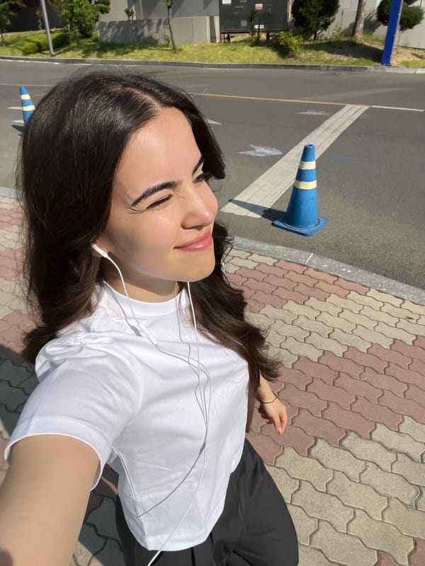 Woman photographed in multiple poses on Daegu street