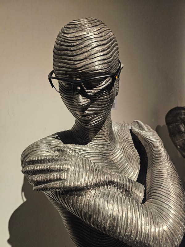 Art sculptures with glasses motif documented across Denpasar