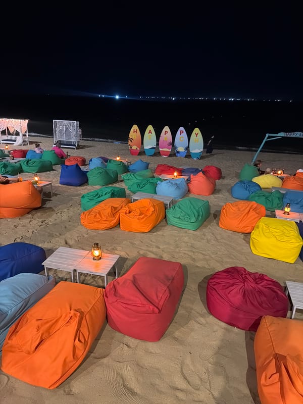 Colorful beanbag chairs arranged on Nha Trang beach