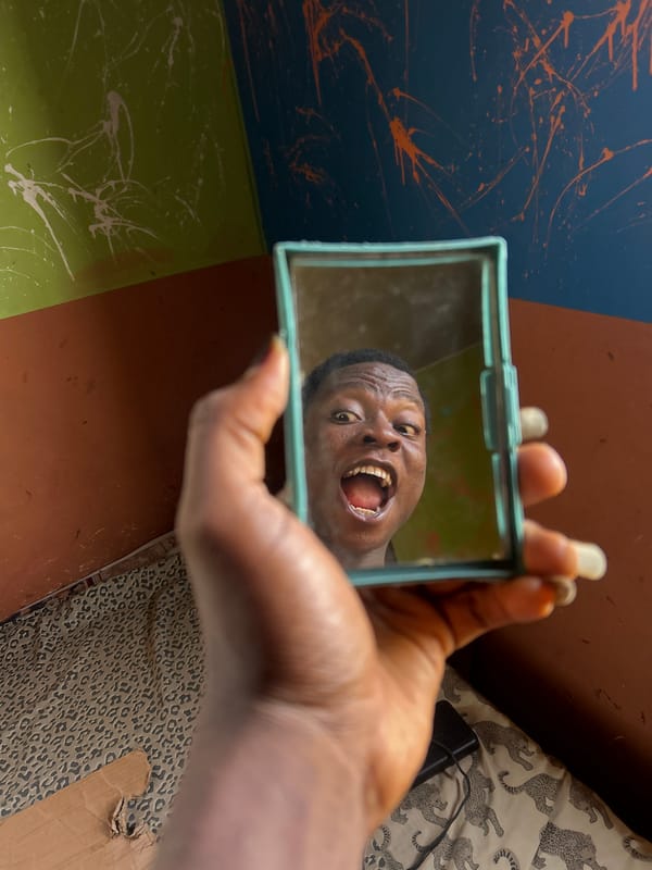 Person captured making expressive faces in playful photo session