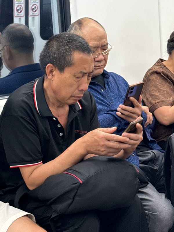 Evening commuters ride public transit in Yuzhong District
