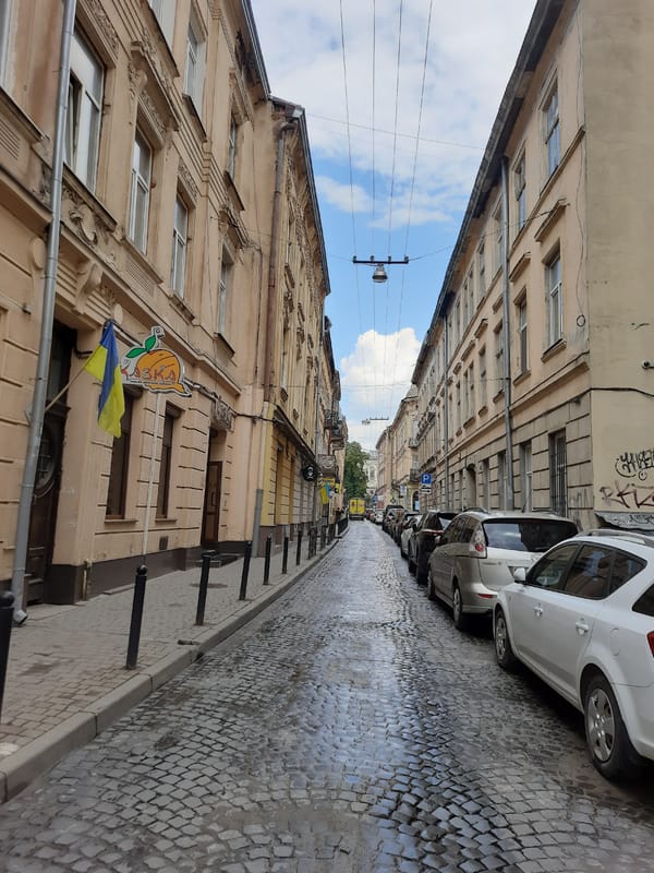 Rainy afternoon in Lviv's historic center, trams and old streets