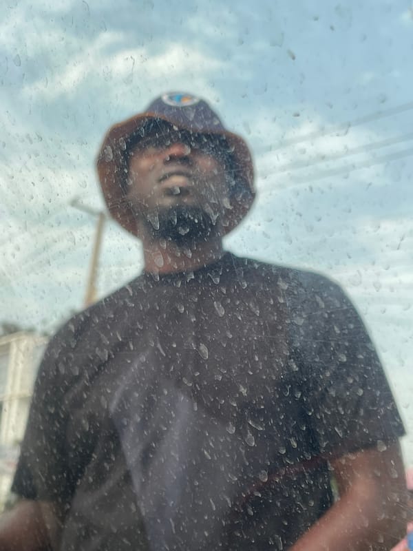 Street life documented across Jos, Nigeria during afternoon hours