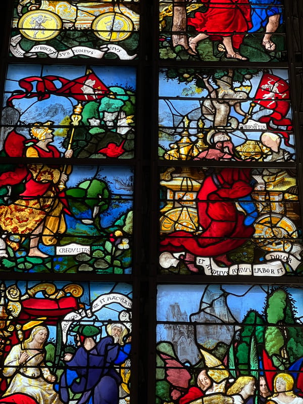 Tourist documents historic Rouen landmarks and stained glass