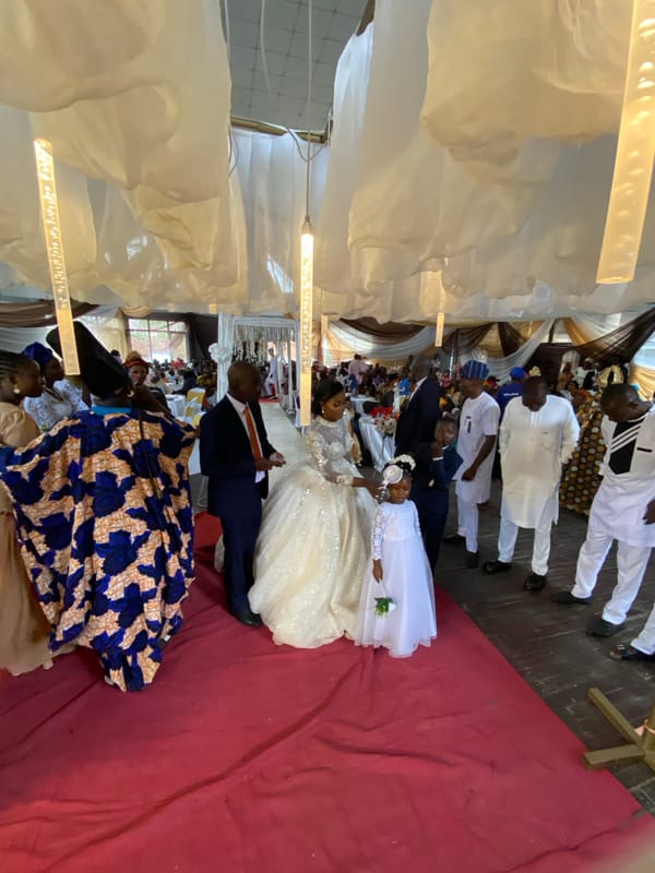 Wedding celebration in Bukuru, Nigeria, with dancing and ceremony moments.